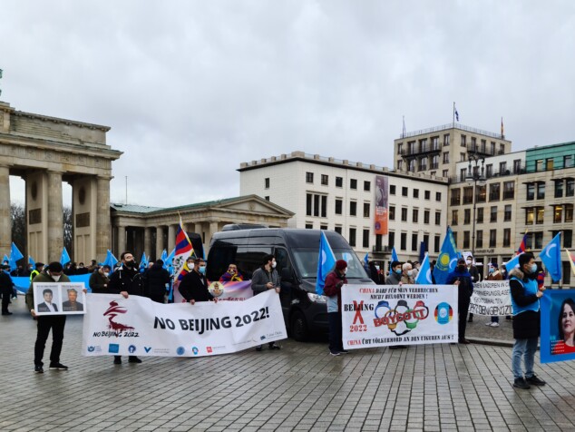 this photo shows protesters in Berlin, protesting against China&#039;s policies in Xinjiang