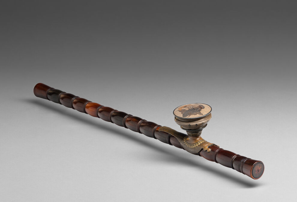 Opium pipe, China, Qing dynasty to Republican period, inscribed with cyclical date corresponding to 1868 or 1928. Water buffalo horn, metal, and ceramic. Harvard Art Museums/Arthur M. Sackler Museum, Bequest of Grenville L. Winthrop, 1943.55.6.